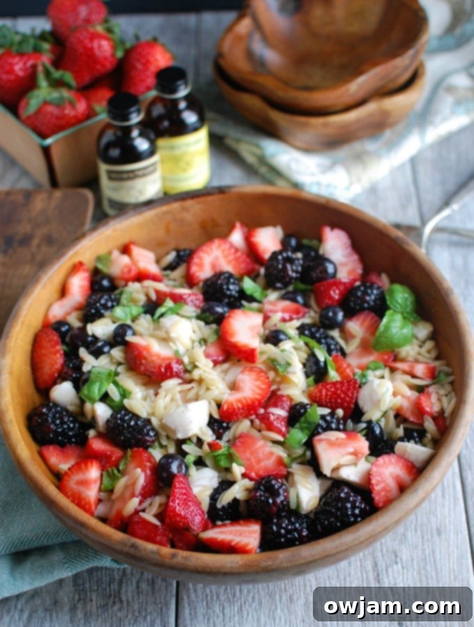 Bright and fresh Mixed Berry Caprese Orzo Salad, perfect for summer entertaining