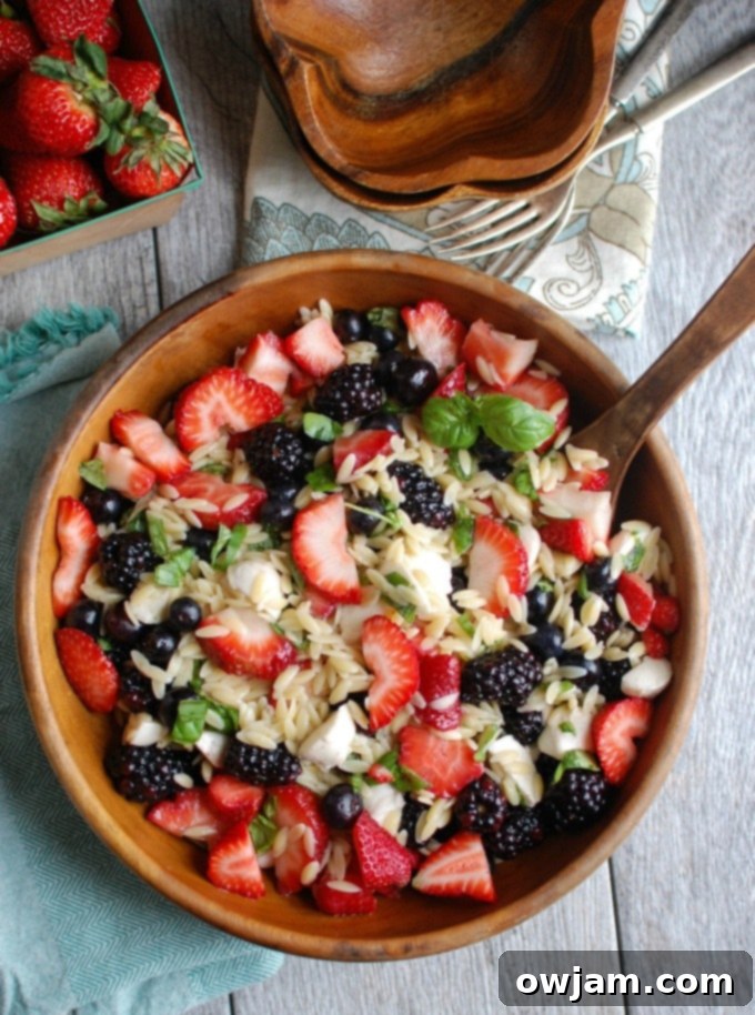Delicious and easy Mixed Berry Caprese Orzo Salad, perfect for a gathering