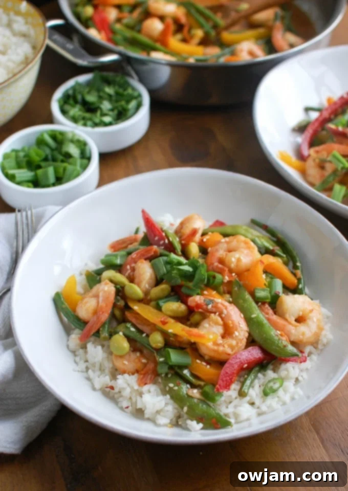 Vibrant Asian Shrimp Edamame Stir-Fry 6 Plated Asian Shrimp Edamame Stir-Fry, emphasizing its heart-healthy components.
