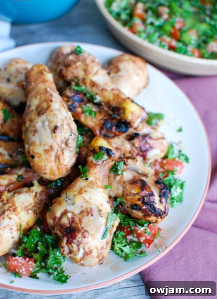 Vibrant Mediterranean Chicken with Basmati Rice 5 A vibrant platter of Mediterranean Chicken with Basmati Rice and fresh herbs, perfect for a family meal