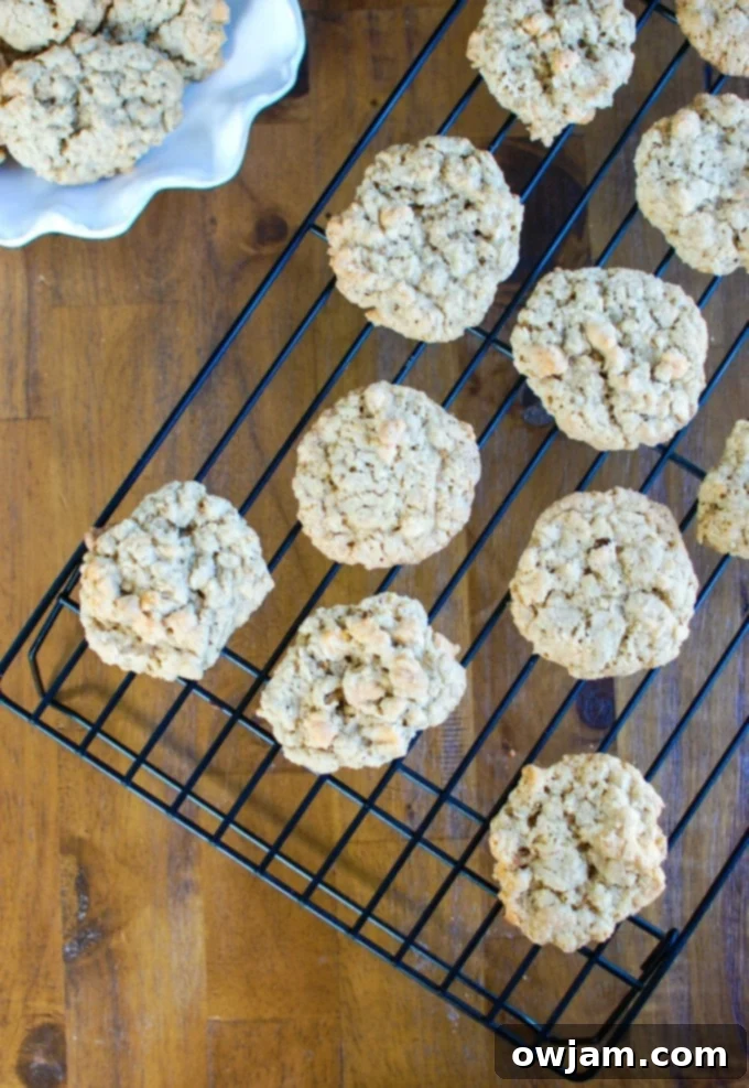 Delicious Oatmeal Scotchies cookies piled on a plate, ready to be enjoyed.