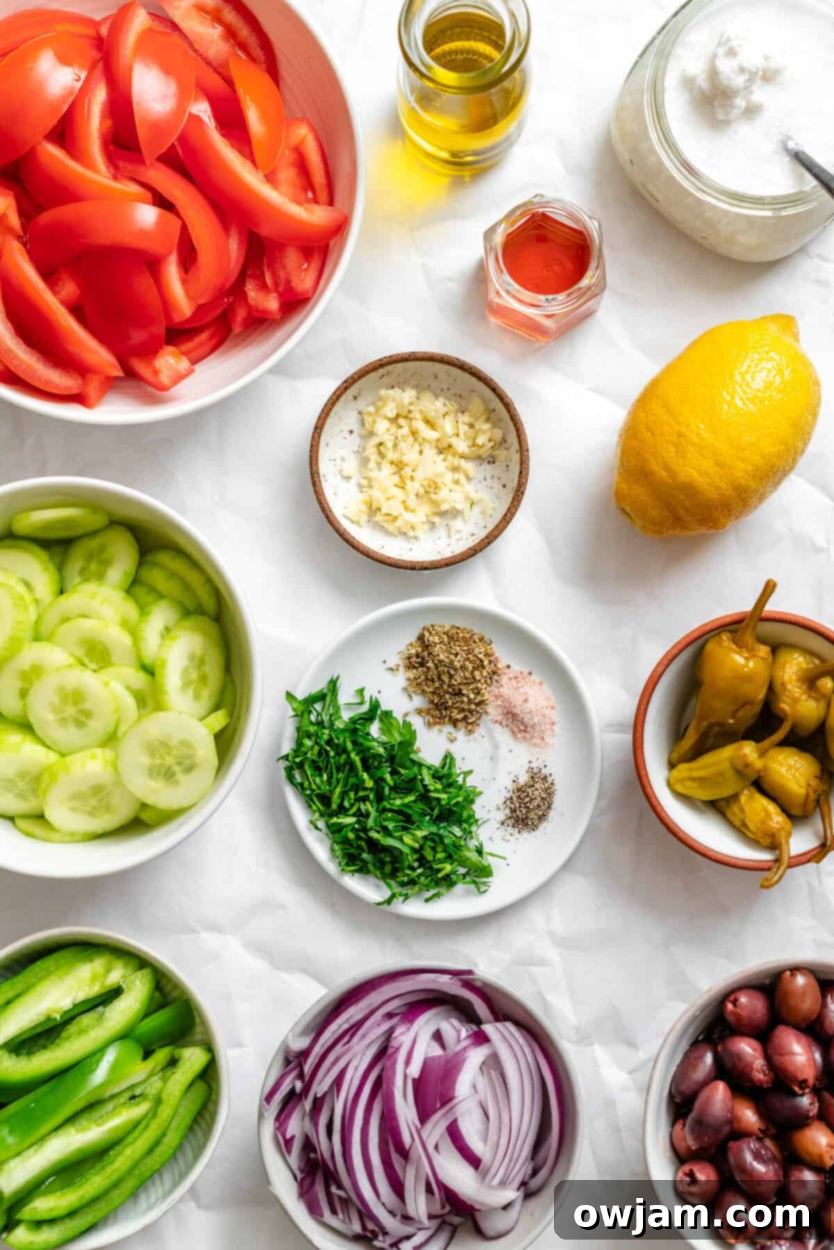Rustic Greek Salad 3 Greek Village Salad recipe ingredients laid out on a wooden board