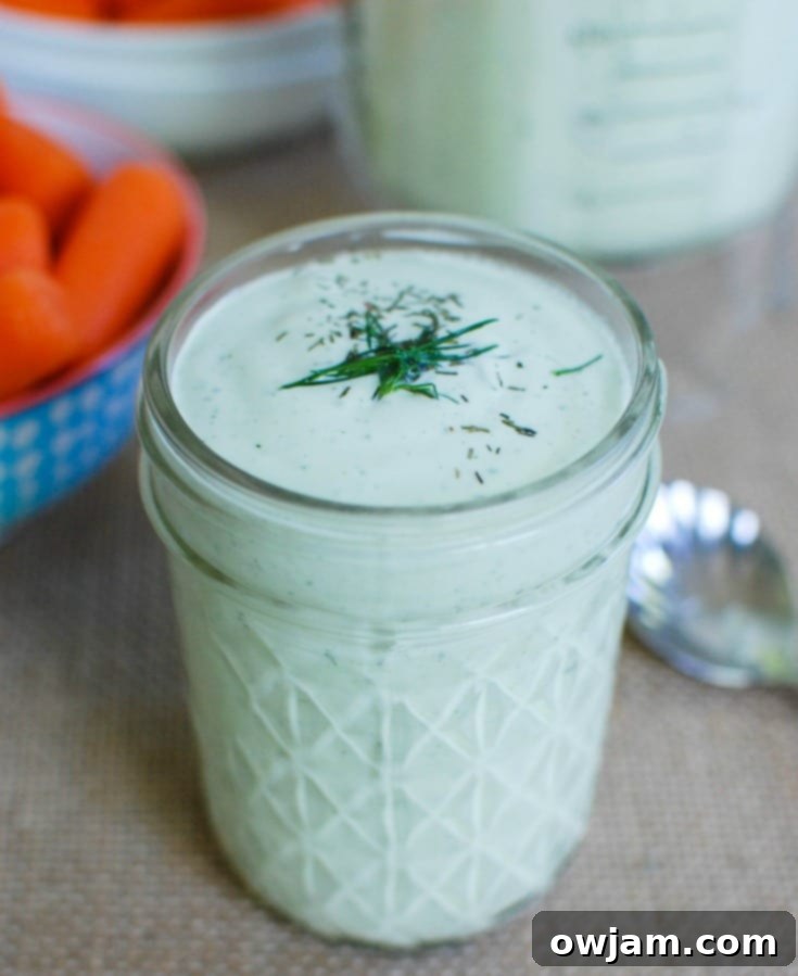 Creamy Dill Sauce served in a mason jar with fresh dill, ready to be enjoyed as a versatile dressing or dip.