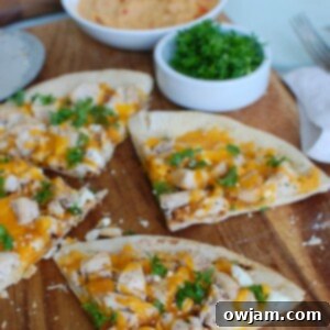 Chicken Feta Cheddar Pita Pizzazz 5 Chicken Feta Cheddar Pita Pitza with parsley.