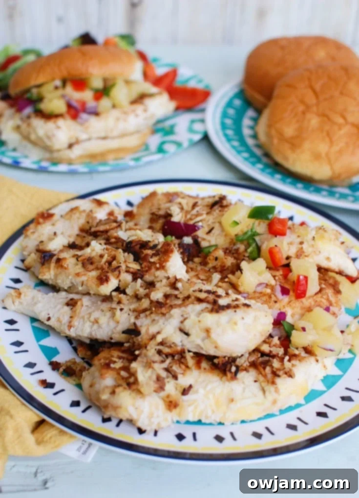 Tropical Macadamia Coconut Crusted Chicken with Pineapple Salsa 2 Macadamia Coconut Crusted Chicken with Pineapple Salsa makes the perfect fresh, summer meal. Tropical flavors pair nicely with the chicken for an unforgettable experience!