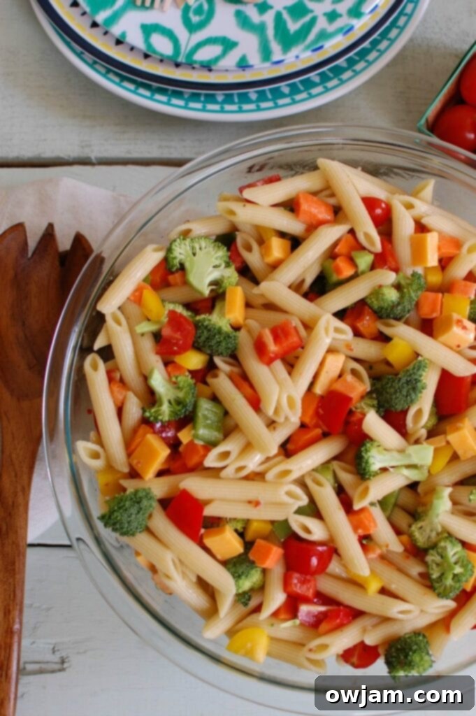 An easy and refreshing Classic Pasta Salad, versatile and ideal for any casual meal or gathering.
