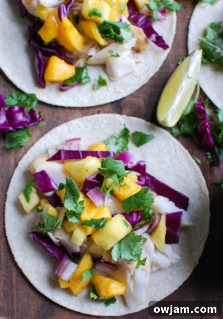 Grilled Fish Tacos: A Tropical Salsa Sensation 3 Grilled Fish Tacos with Tropical Salsa with cabbage