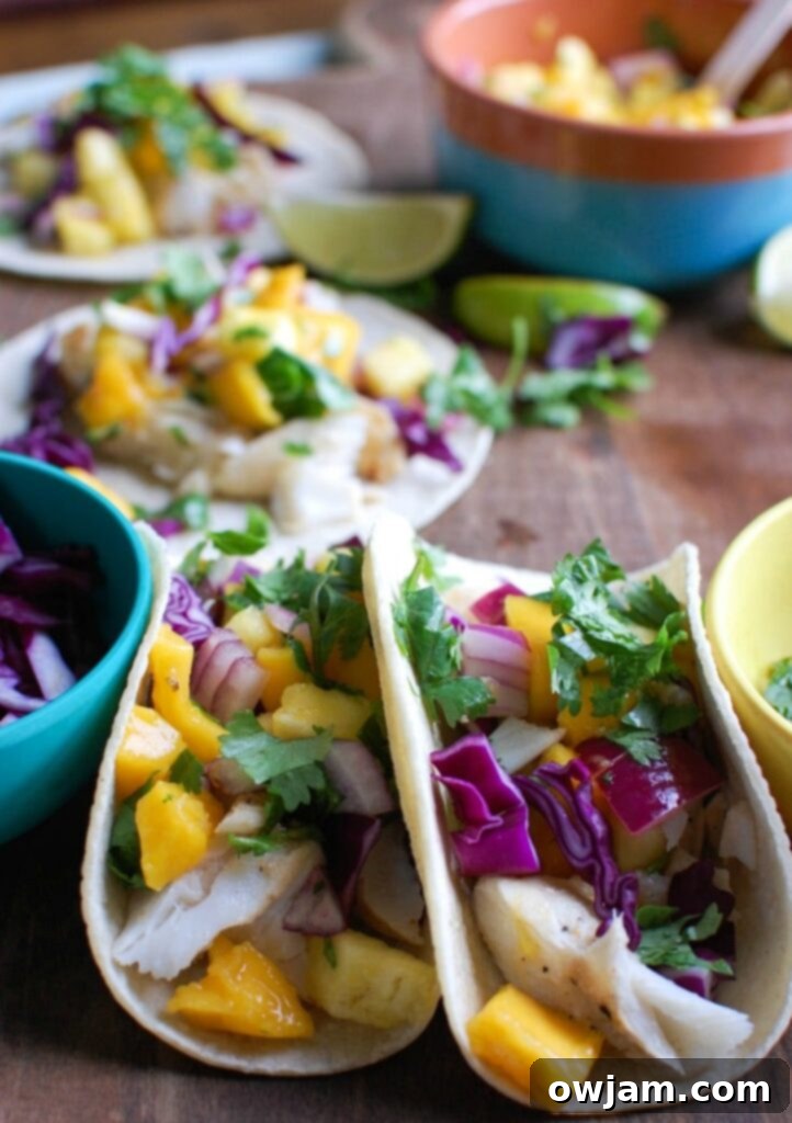 Grilled Fish Tacos: A Tropical Salsa Sensation 5 Grilled Fish Tacos with Tropical Salsa in taco shell