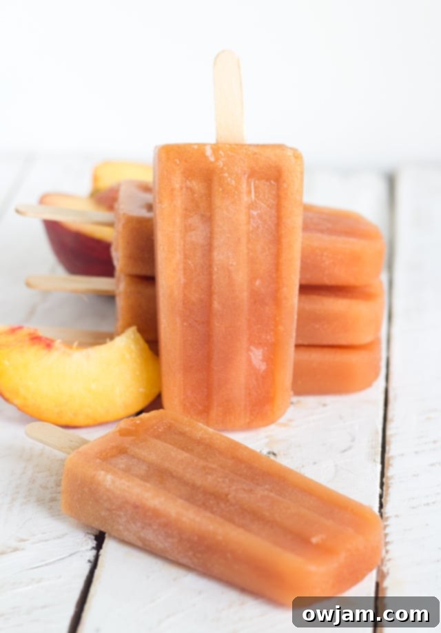 25 Icy Delights to Beat the Summer Heat 18 boozy-sweet-peach-tea-popsicles2