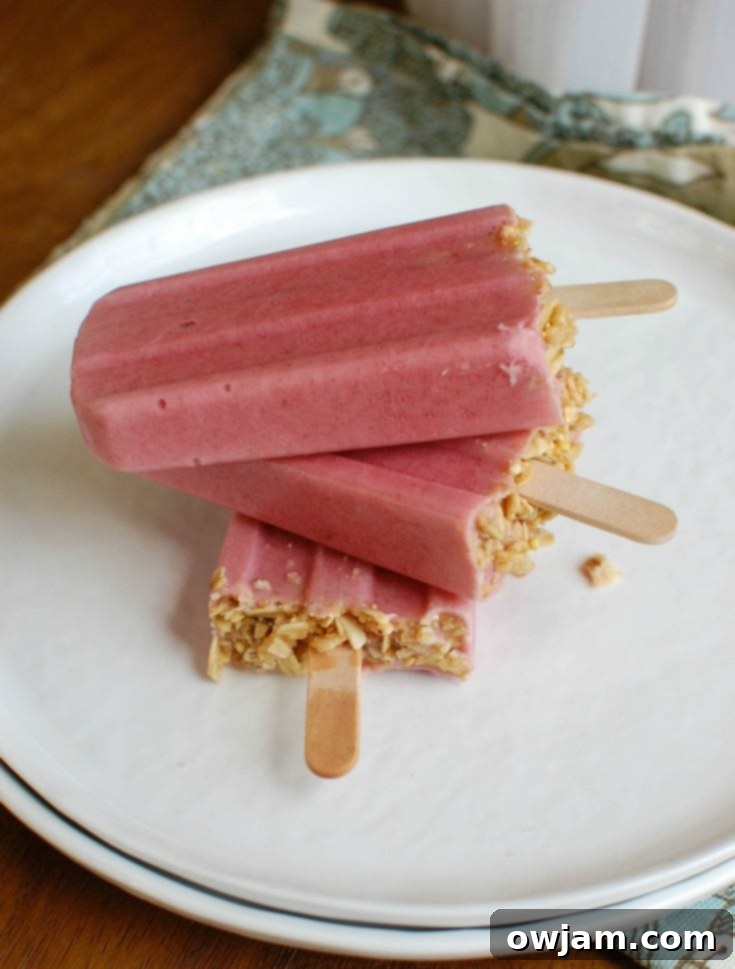 Cool and refreshing Strawberry Banana Yogurt Popsicles, a healthy kid-favorite treat to beat the heat.