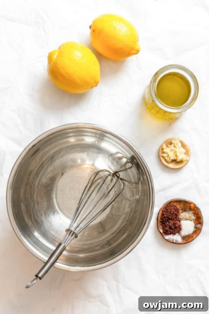 Ingredients for Fattoush Salad dressing: garlic, salt, pepper, lemon, olive oil, sumac