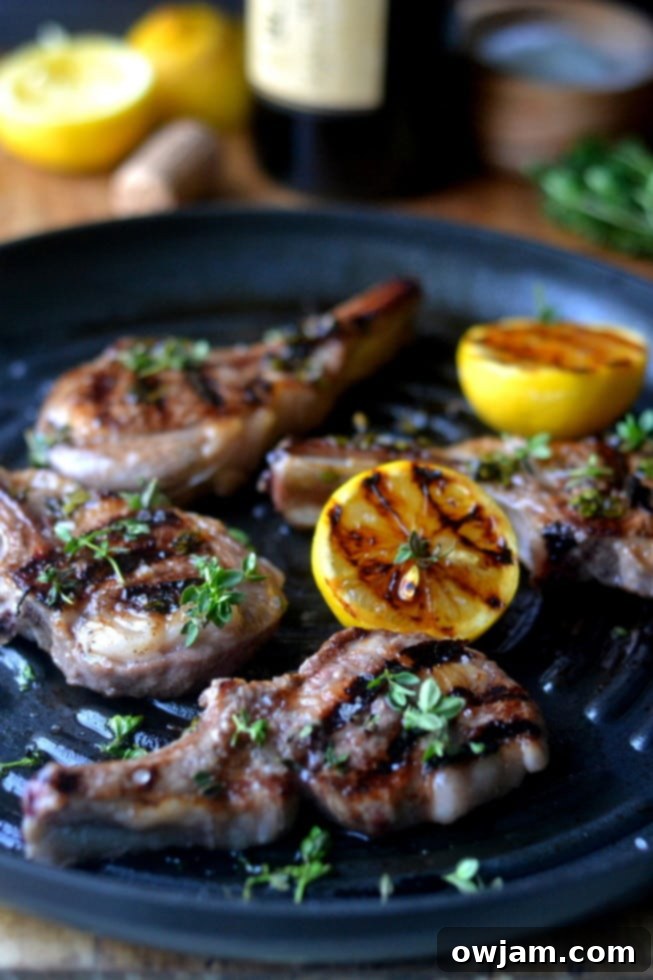 Lemon Thyme Lamb Chops served with a side of fresh vegetables.
