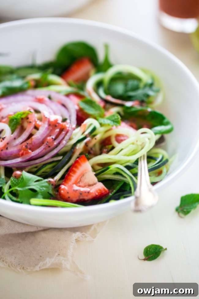 Spiralized Cucumber Salad with Chia Seed and Strawberry Vinaigrette.