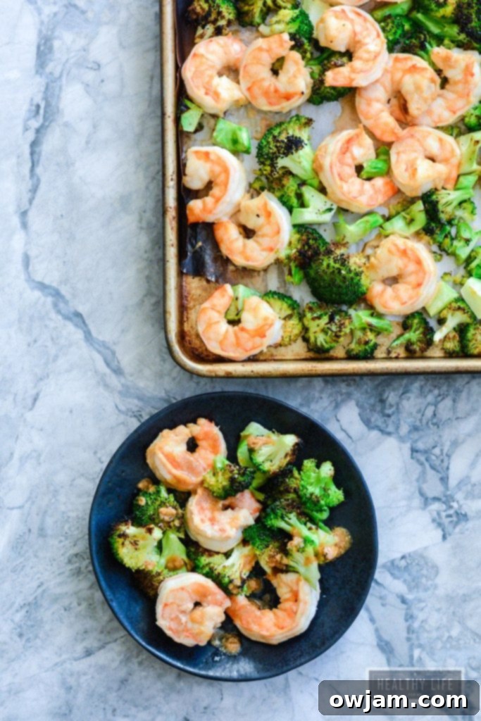 Broiled Shrimp and Broccoli with Spicy Cashew Sauce in a white bowl, ready to serve.