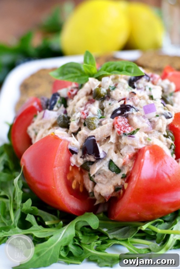 Mediterranean Tuna Salad served in a bowl with fresh vegetables and olives.