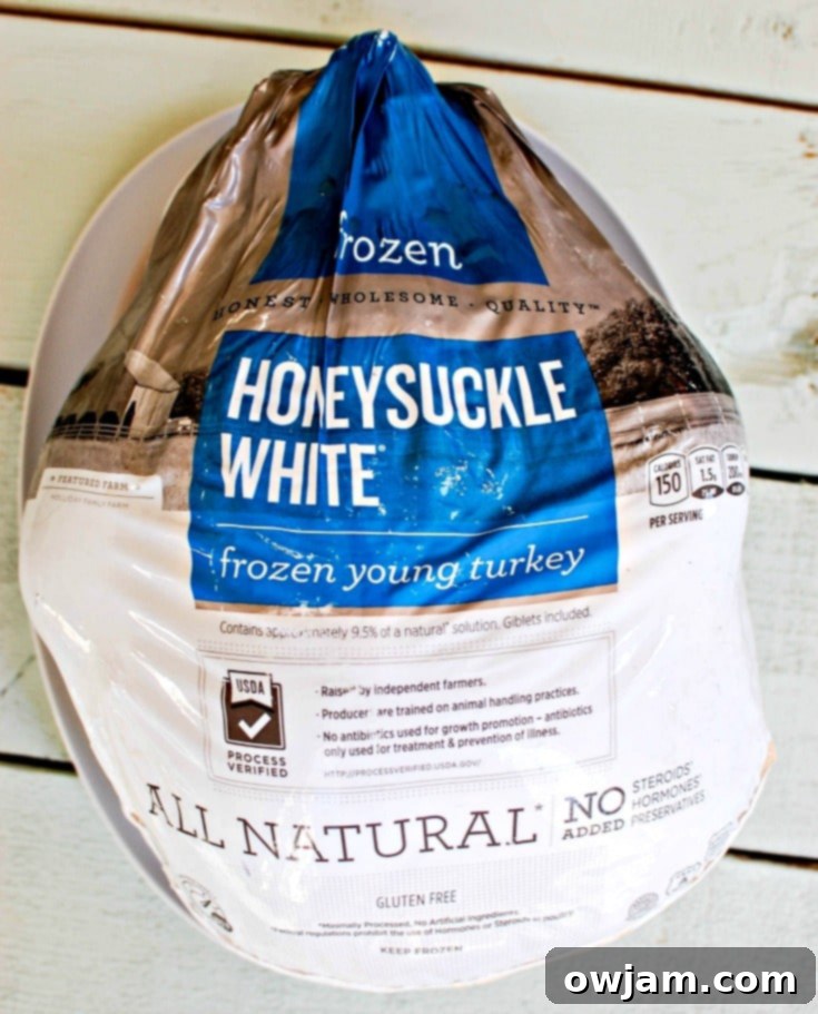 Packaging of a Honeysuckle White Frozen Young Turkey, highlighting its antibiotic-free claims.