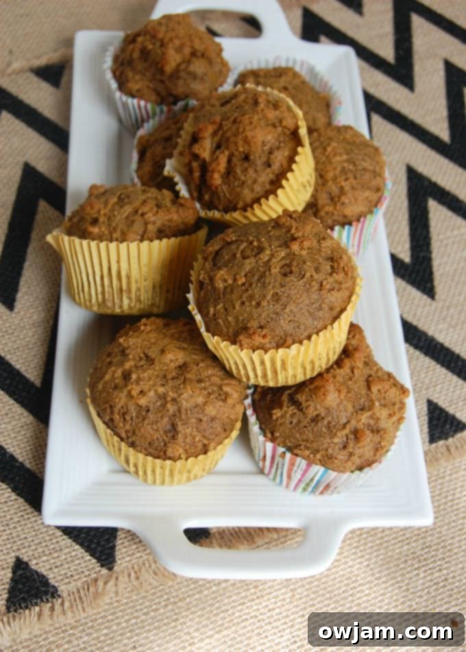 Delicious Easy Pumpkin Muffins with a sprinkle of cinnamon.