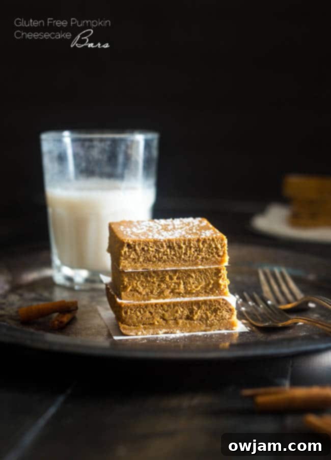 Healthy Pumpkin Cheesecake Bars with a flaky crust.