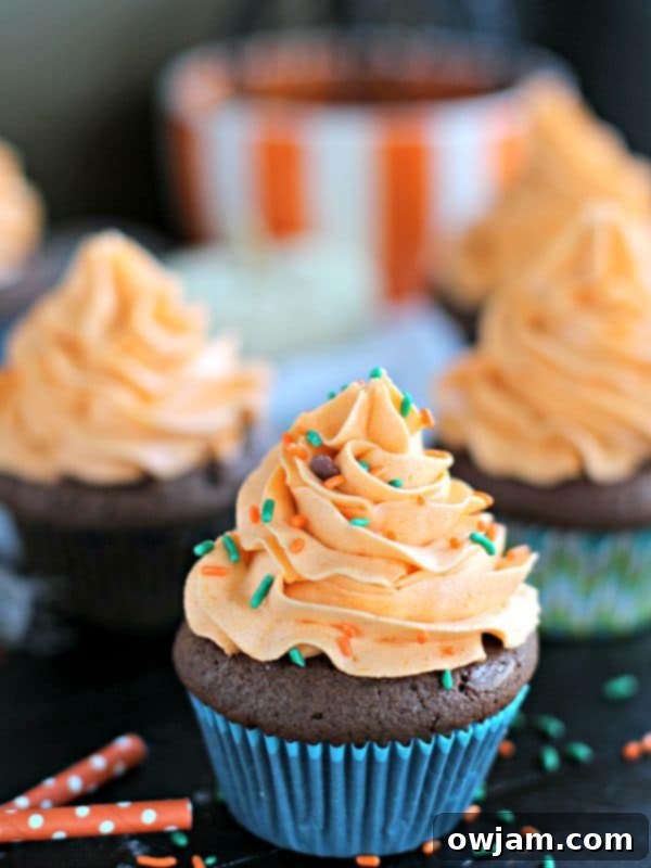 Pumpkin Brownie Cupcakes with swirled toppings.