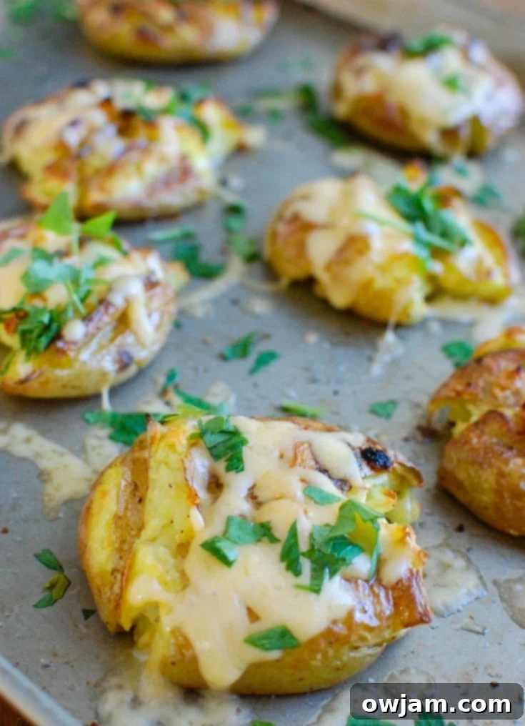 Creamy Gouda Smashed Potatoes 2 Golden potatoes are drizzled with olive oil and garlic and baked until crispy and then topped with gouda and warmed until the cheese is warm and melted. Gouda Smashed Potatoes are the perfect holiday side dish that will impress your guests.