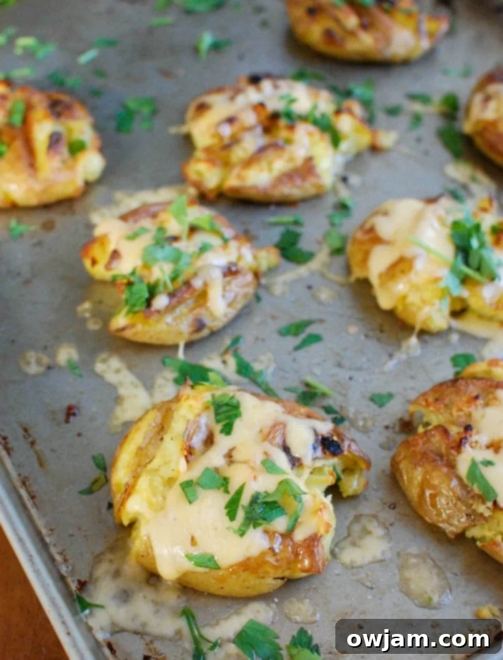 Creamy Gouda Smashed Potatoes 4 Golden potatoes are drizzled with olive oil and garlic and baked until crispy and then topped with gouda and warmed until the cheese is warm and melted. Gouda Smashed Potatoes are the perfect holiday side dish that will impress your guests.