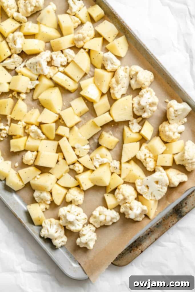 Cauliflower Potato Fusion Salad 6 Cauliflower Potato Salad roasting on a baking sheet