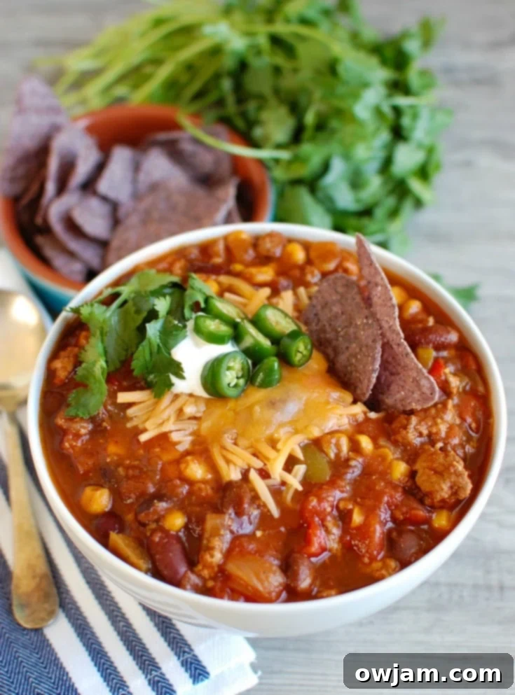 Slow Cooker Turkey Chili is a leaner chili than when beef is used but is still hearty and flavorful. Put this in the crockpot, go about your day and come home to a delicious bowl of chil