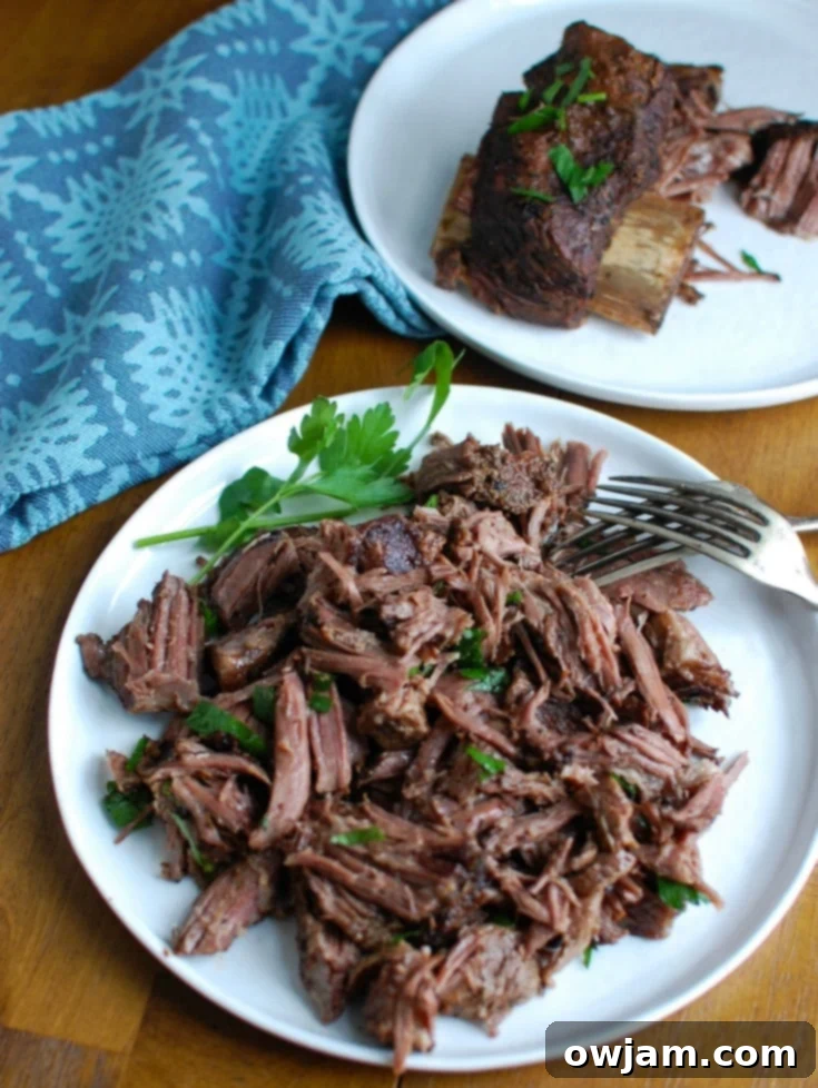 Effortlessly Elegant Red Wine Slow Cooker Ribs 5 Cooked Slow Cooker Red Wine Short Ribs in a slow cooker, showcasing the rich color and texture.