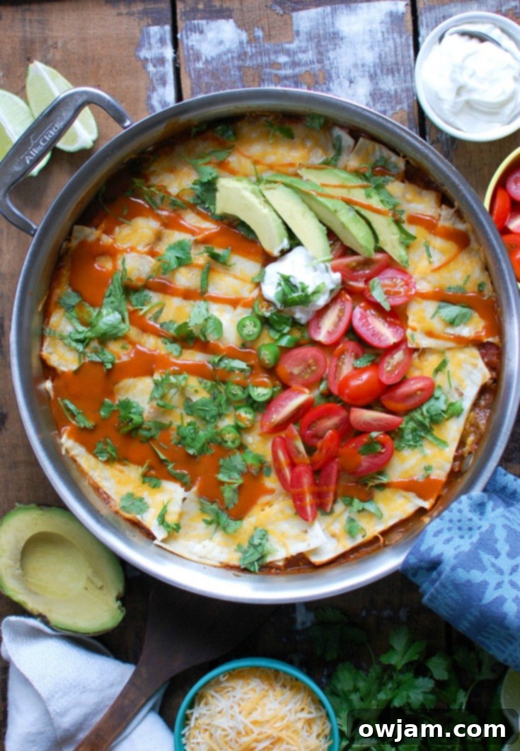 Beef Enchilada Casserole baked in a large skillet, ready to be served