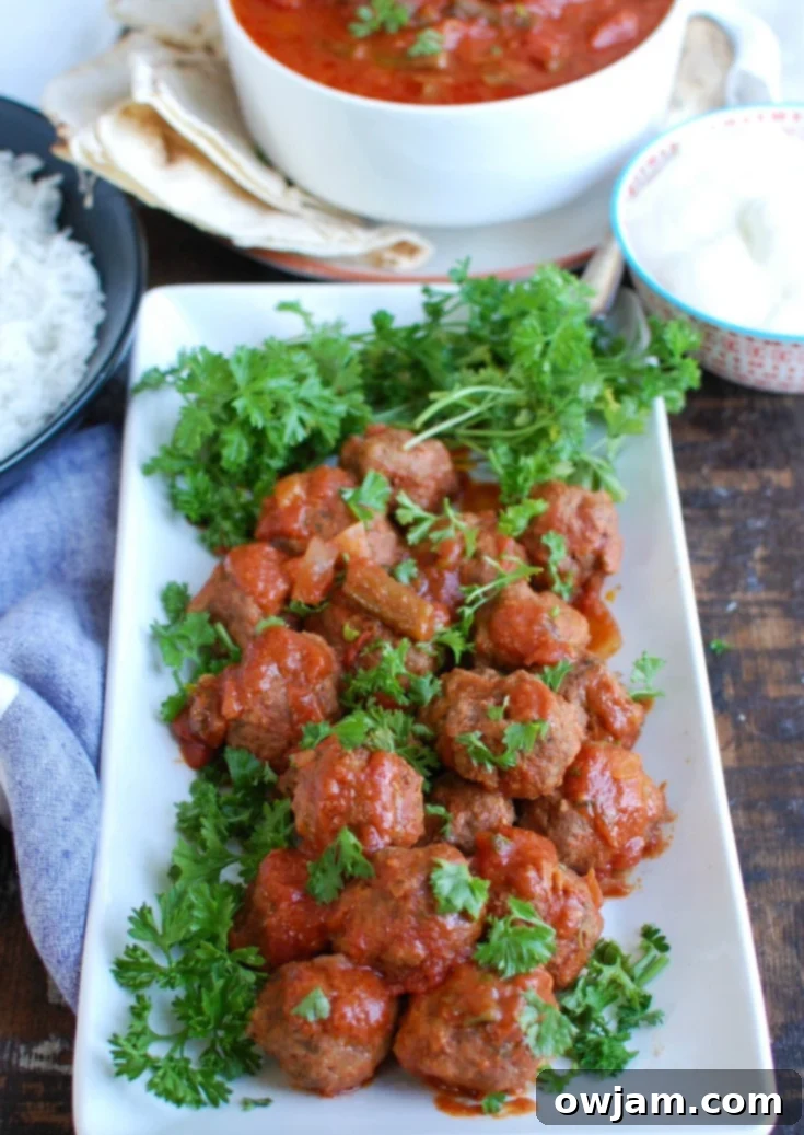 Savory Mediterranean Slow Cooker Beef Meatballs 5 Prepared Slow Cooker Mediterranean Beef Meatballs with Lebanese Green Beans, ready to be served.