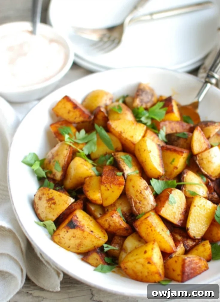 Your favorite potatoes are tossed in olive oil and smoked paprika and roasted until they are soft on the inside and crispy on the outside paired with a creamy yogurt dipping sauce. These Paprika Roasted Potatoes with Spiced Yogurt Sauce make the perfect side dish to any meal.