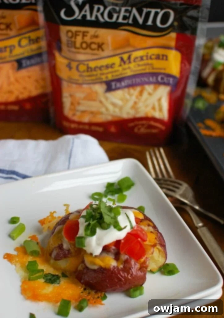 Crispy Loaded Smashed Spuds 5 Loaded Smashed Potatoes are crispy on the outside and soft on the inside and loaded with cheese, sour cream, tomatoes, green onion and cilantro. These make an easy family meal or appetizer for game day or a party!