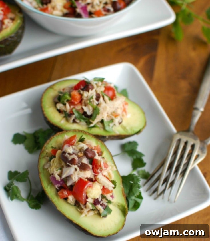 Zesty Mexican Tuna Avocado Boats 3 Mexican Tuna Stuffed Avocados mixes tuna, black beans, fresh vegetables, lime juice and spices to create a healthy and easy snack or lunch that is also heart healthy.