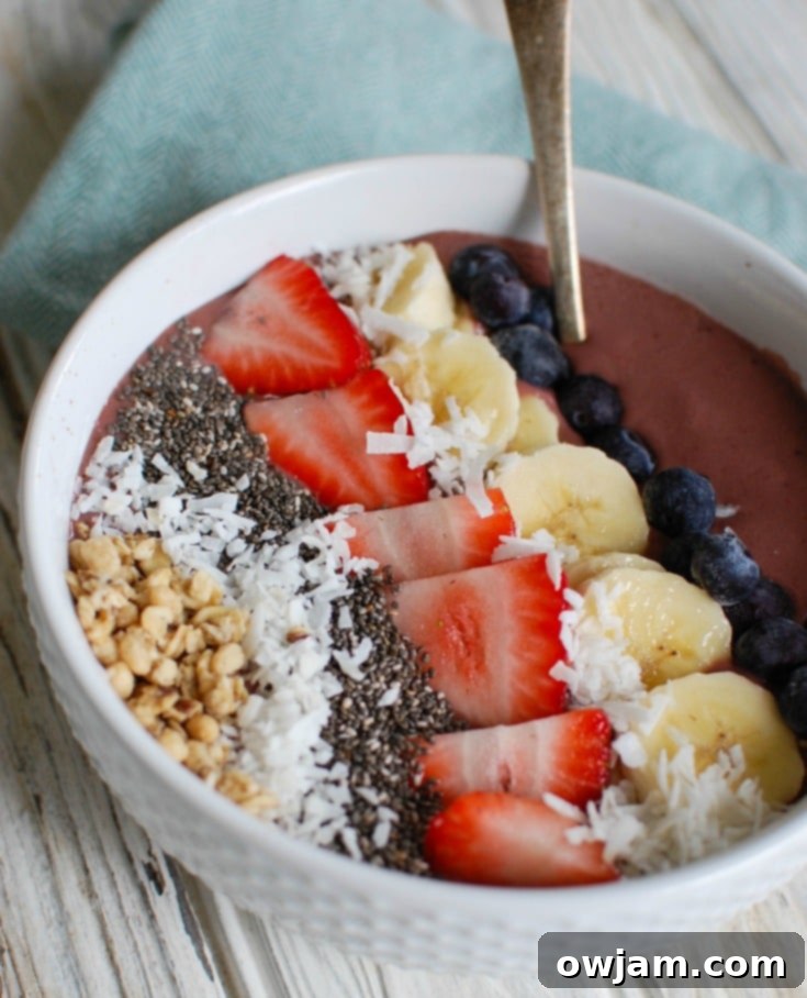 Vibrant Chia Fruit Delight 3 Chia Seeds Fruit Bowl with spoon.