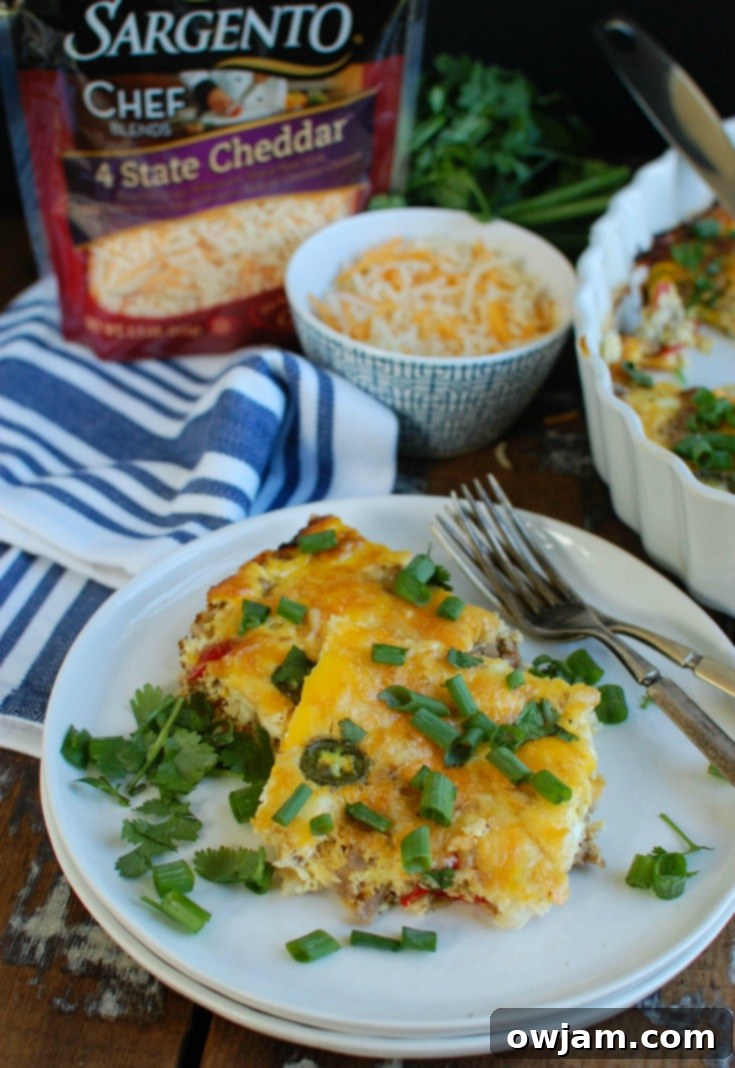 Southwest Sunrise Bake 7 Southwestern Breakfast Casserole cut on a plate with forks.