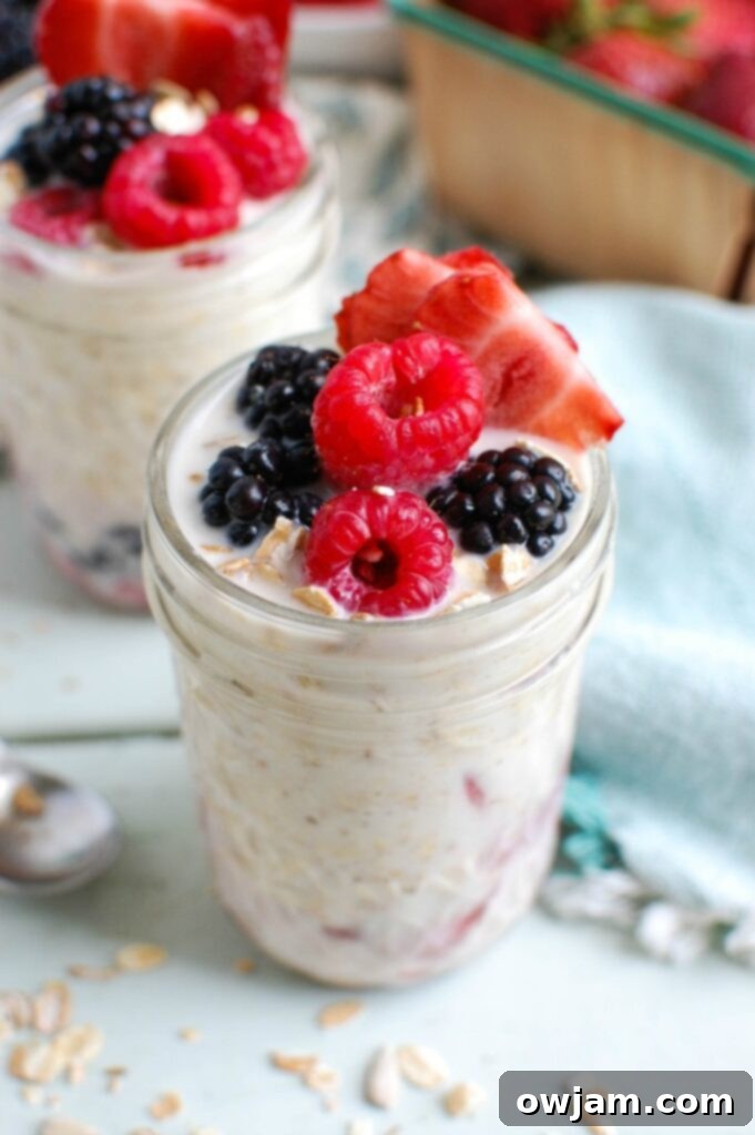 Overnight Triple Berry Oatmeal is a protein and calcium packed breakfast that is perfect for back-to-school or an on-the go snack. Oats are soaked overnight with milk and Greek yogurt and paired with three berries: blueberries, raspberries and strawberries. You can't beat a quick and easy breakfast that also tastes delicious! 