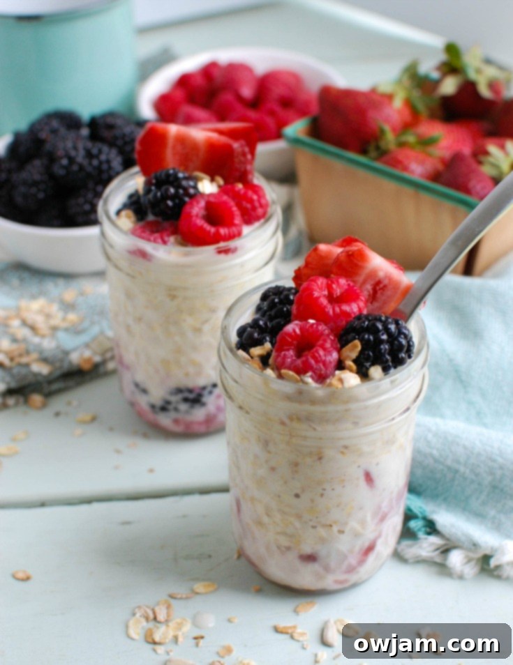 Overnight Triple Berry Oatmeal is a protein and calcium packed breakfast that is perfect for back-to-school or an on-the go snack. Oats are soaked overnight with milk and Greek yogurt and paired with three berries: blueberries, raspberries and strawberries. You can't beat a quick and easy breakfast that also tastes delicious! 
