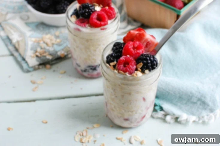 Overnight Triple Berry Oatmeal is a protein and calcium packed breakfast that is perfect for back-to-school or an on-the go snack. Oats are soaked overnight with milk and Greek yogurt and paired with three berries: blueberries, raspberries and strawberries. You can't beat a quick and easy breakfast that also tastes delicious! 