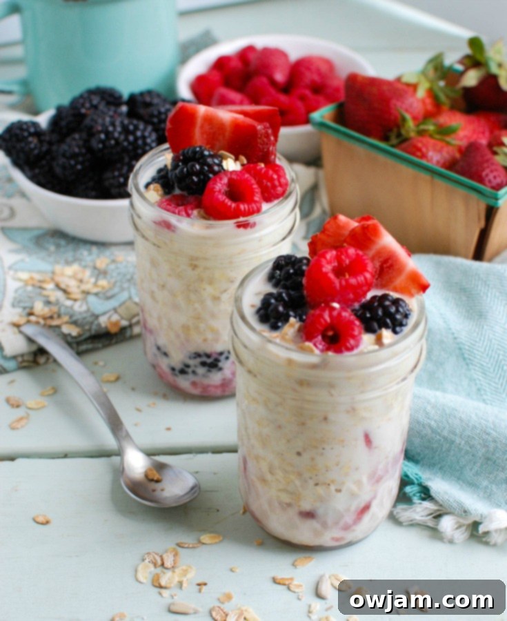 Overnight Triple Berry Oatmeal is a protein and calcium packed breakfast that is perfect for back-to-school or an on-the go snack. Oats are soaked overnight with milk and Greek yogurt and paired with three berries: blueberries, raspberries and strawberries. You can't beat a quick and easy breakfast that also tastes delicious! 