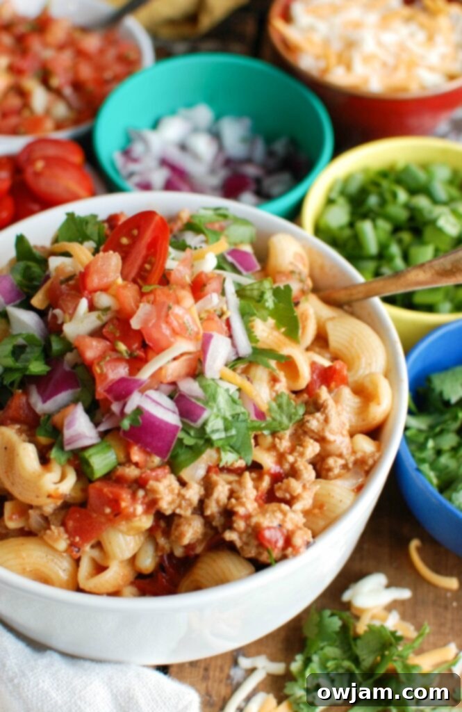 Easy Weeknight Instant Pot Turkey Taco Pasta 3 Instant Pot Turkey Taco Pasta with garnishes