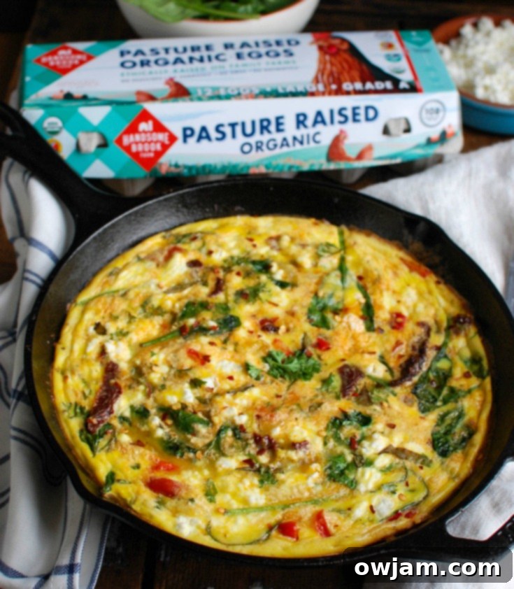 Sun-Dried Tomato Goat Cheese Frittata is a savory breakfast packed with healthy, filling ingredients. Sun-Dried tomatoes, spinach, red bell pepper, goat cheese and eggs are cooked and then baked to perfection. Serve this at a brunch or make it ahead of time for a quick weekday breakfast.