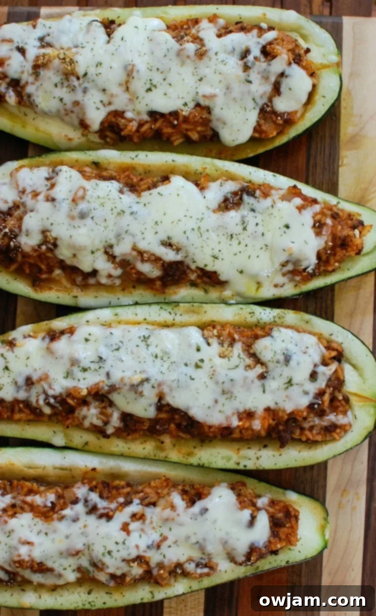Cheesy Chicken and Broccoli Bake 8 Close-up of Mediterranean Zucchini Boats, stuffed with a hearty meat and rice mixture, topped with melted Sargento® Shredded 6 Cheese Italian and fresh parsley, a perfect way to use summer zucchini.