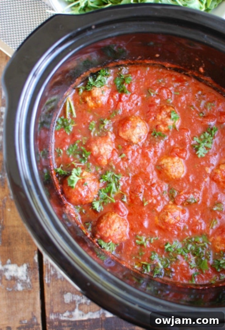 Tender Slow Cooker Veal Meatballs 5 Slow Cooker Veal Meatballs in crockpot.