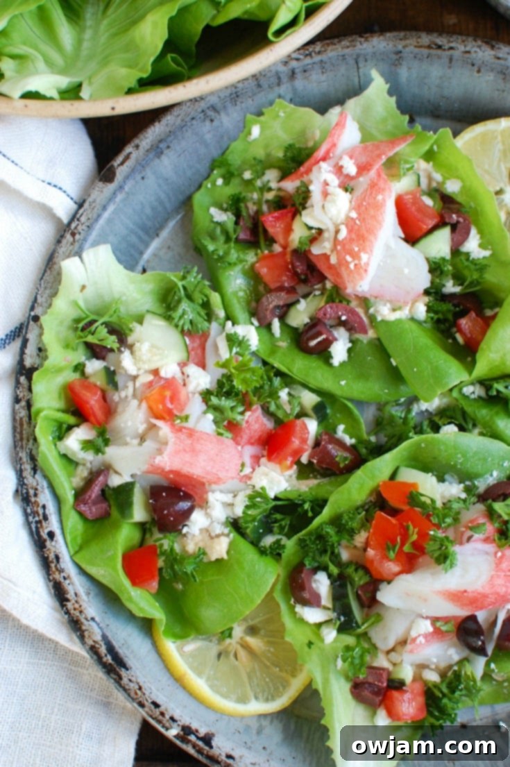 Fresh Mediterranean Surimi Lettuce Wraps with crisp lettuce, colorful vegetables, and creamy surimi filling, perfect for a healthy, low-carb meal.