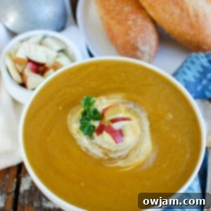 Butternut Apple Bliss Slow Cooker Soup 5 Slow Cooker Butternut Squash Apple Soup is a creamy fall soup that will warm you up. Butternut squash, apples and spices simmer in the crockpot to create an easy meal that is healthy and makes a nice lunch or addition to a dinner.