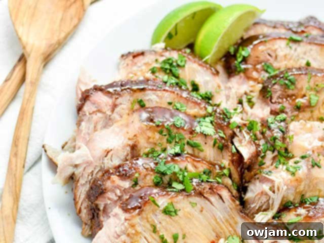 14 Essential Pork Recipes 4 Tender Asian Slow Cooker New York Pork Roast, cooked to perfection in a rich, savory sauce.