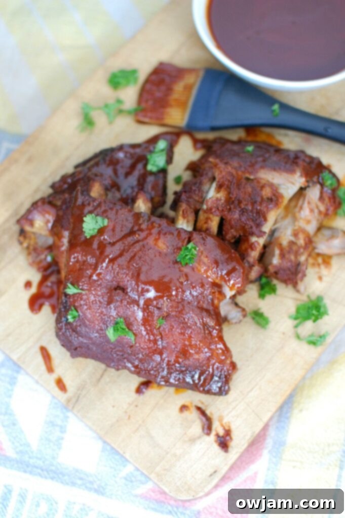 Slow Cooker Ribs 3 Slow Cooker Barbecue Ribs are fall off the bone tender and full of warm spices and flavor. These ribs cook in a slow cooker saving you time and making this meal easy and perfect for a crowd!