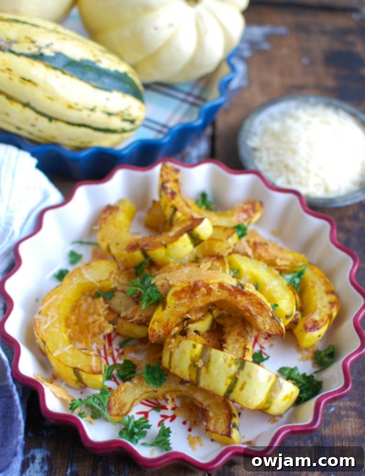 A serving of roasted Parmesan delicata squash in a rustic bowl, ready to be enjoyed as a delicious and easy side dish.