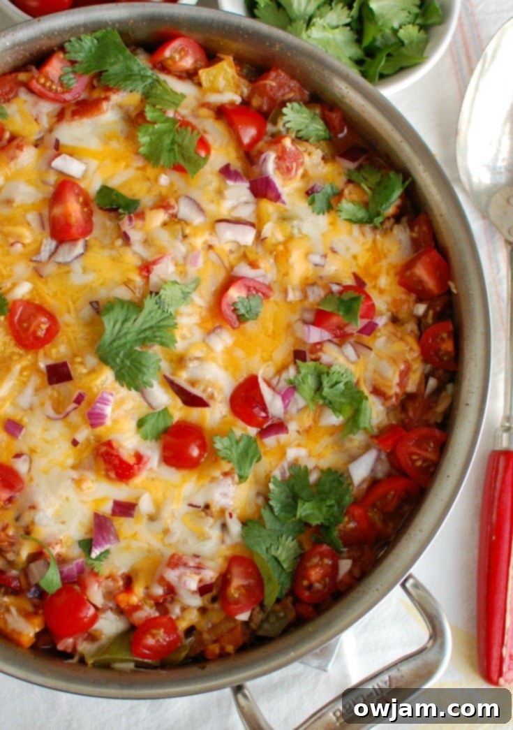 One Pot Fiesta Stuffed Peppers 2 One Pot Mexican Stuffed Pepper Casserole in a dish.
