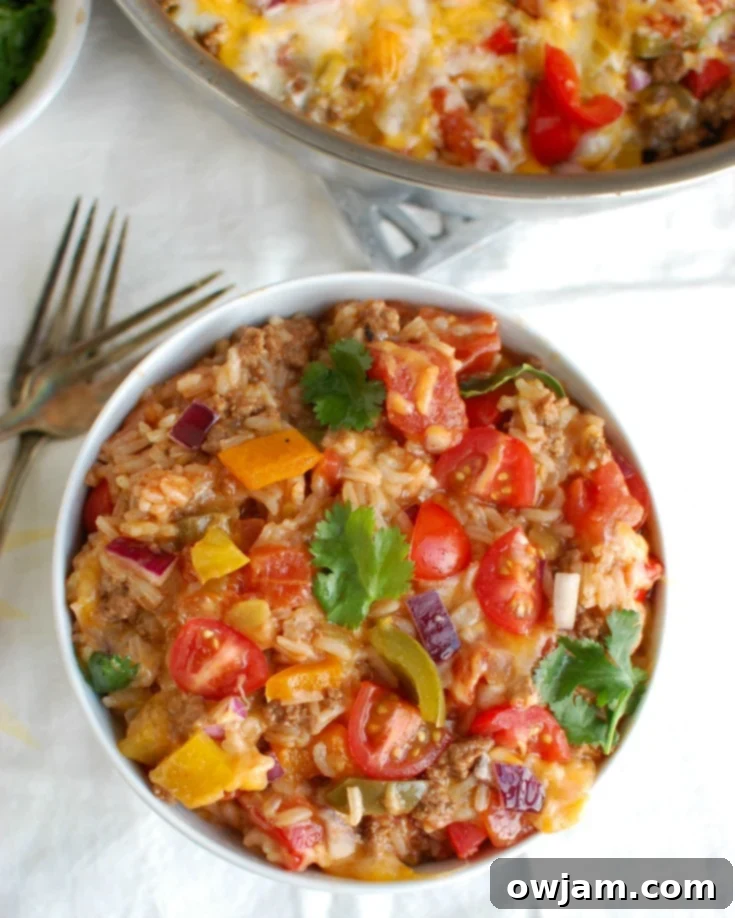 One Pot Fiesta Stuffed Peppers 4 One Pot Mexican Stuffed Pepper Casserole with forks.